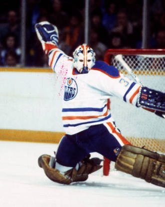 Grant Fuhr stretching across the crease for the Edmonton Oilers